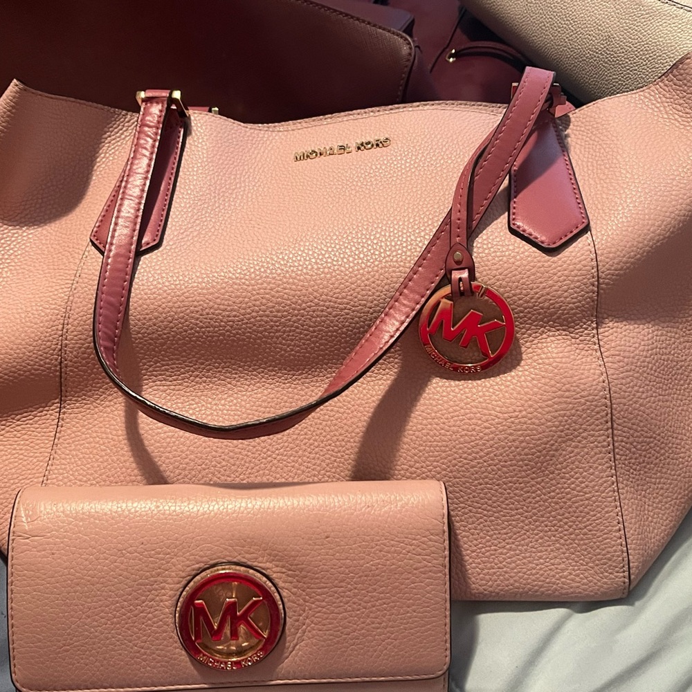 Pink Michael Kors purse and wallet